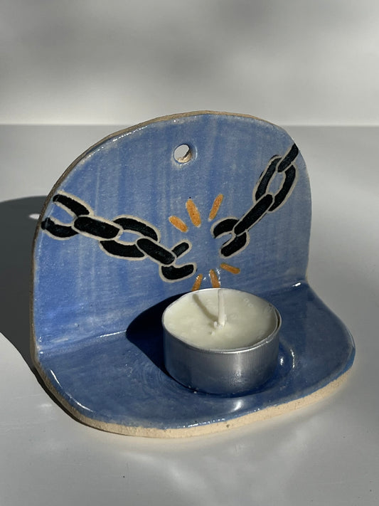 broken chain tea light holder